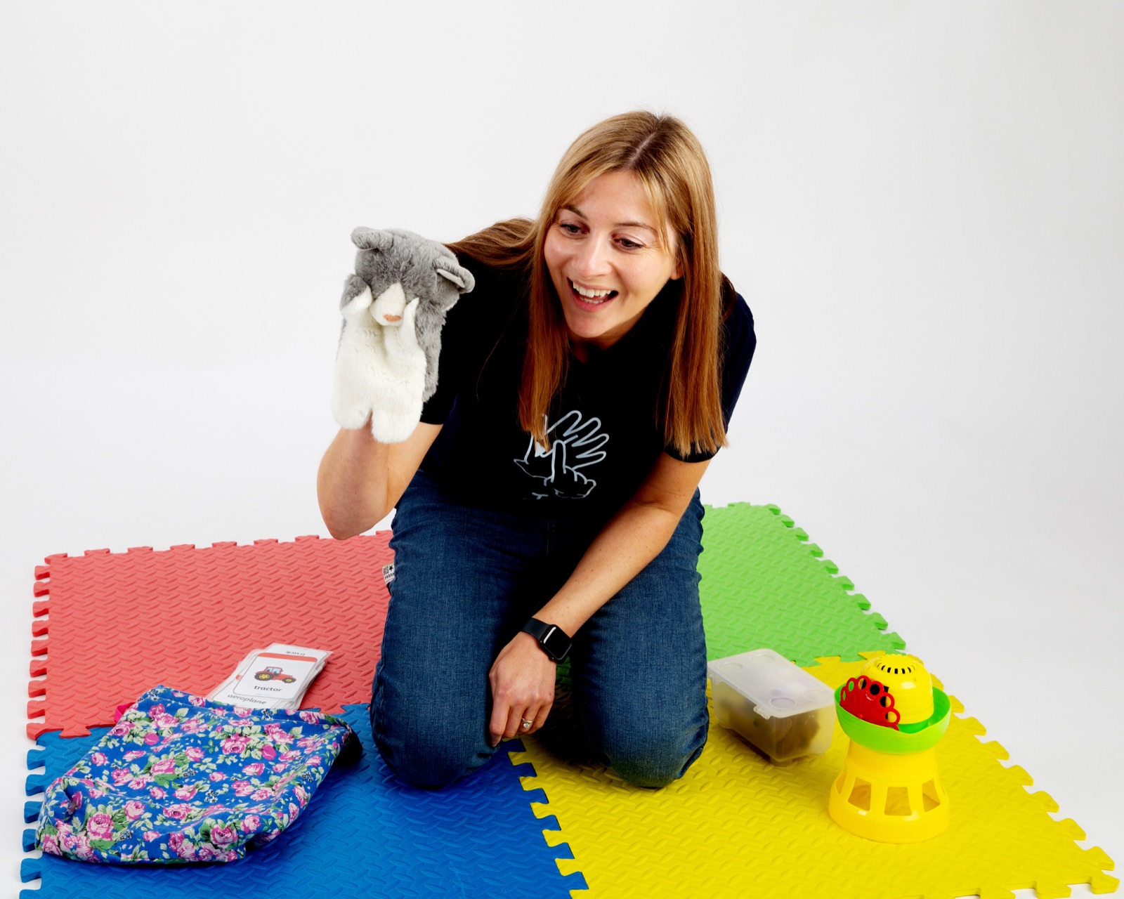 Jen using a puppet during a Sing, Sign & Play session